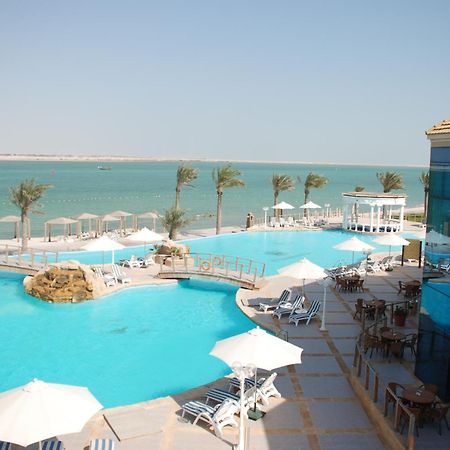 Tio Sea Resort Al Khor Exterior photo The pool at the Grand Hotel